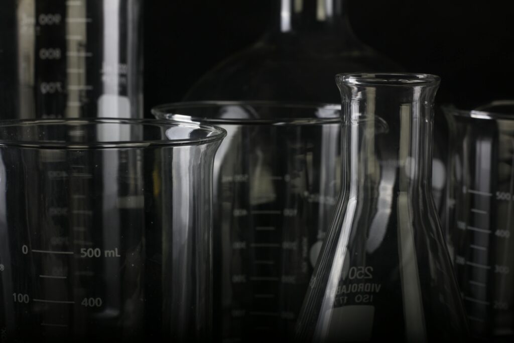 pexels-photo-1366942-1366942-1 A detailed close-up of various transparent laboratory glassware used in scientific experiments.